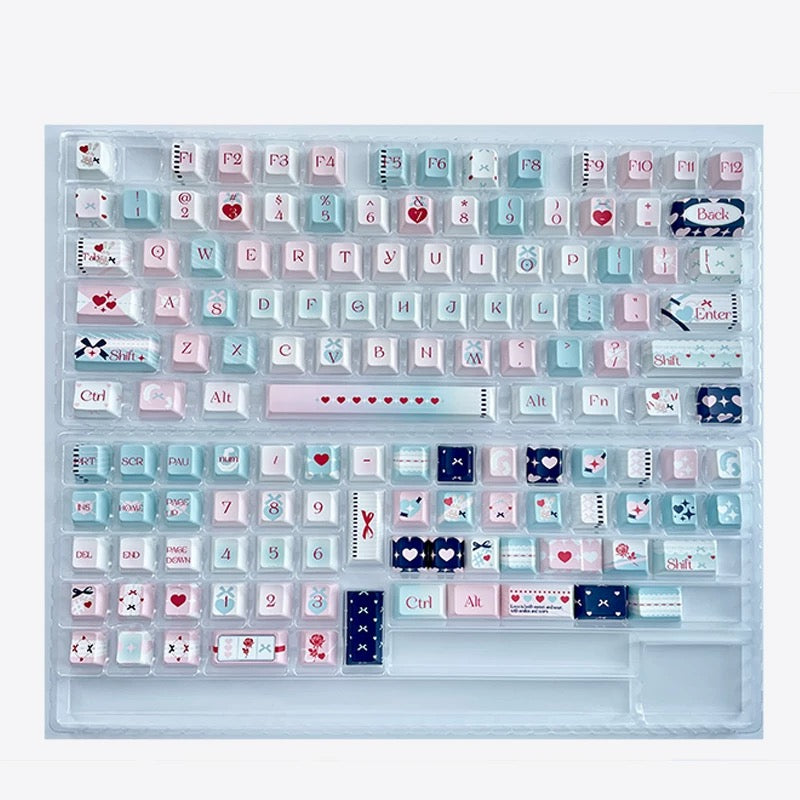 Ocean Breeze love key caps set featuring soft pastel and vibrant tones on a 104-key layout.